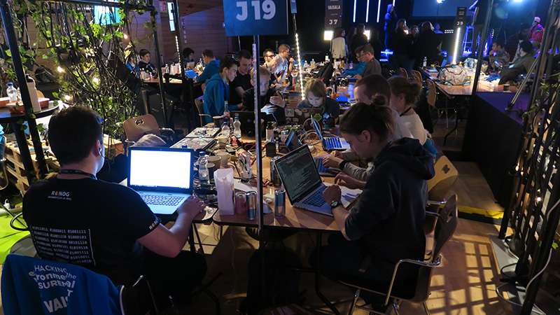 Software developers are working frantically on Vaisala's challenges at Junction 2018.