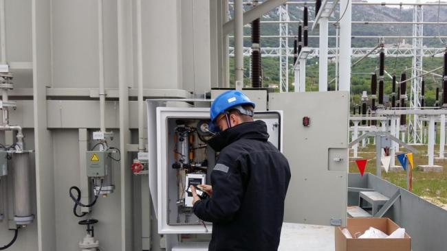 Operator at power transformer