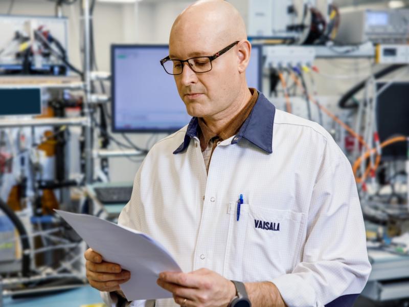 Vaisala engineer doing on-site calibration