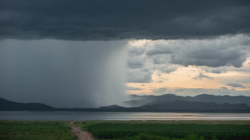 Scenery with black clouds and mountains